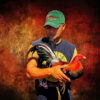 Obed Rivera of Greenville Farm with his gamefowls in the US